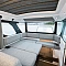 Axopar 38 XC Cross Cabin - разложенный диван в рубке катера